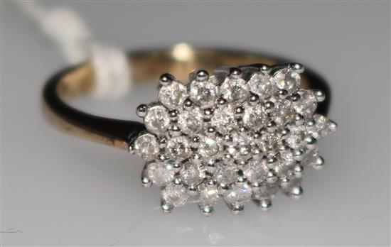 A 9ct gold and diamond cluster dress ring, size L.